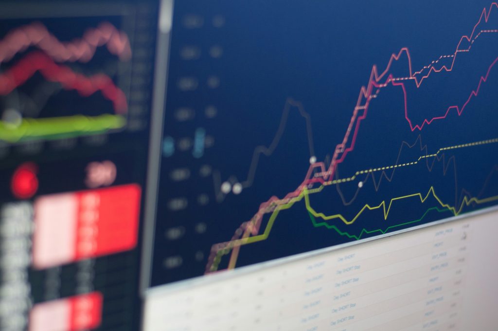 Multiple financial market lines on trading screens