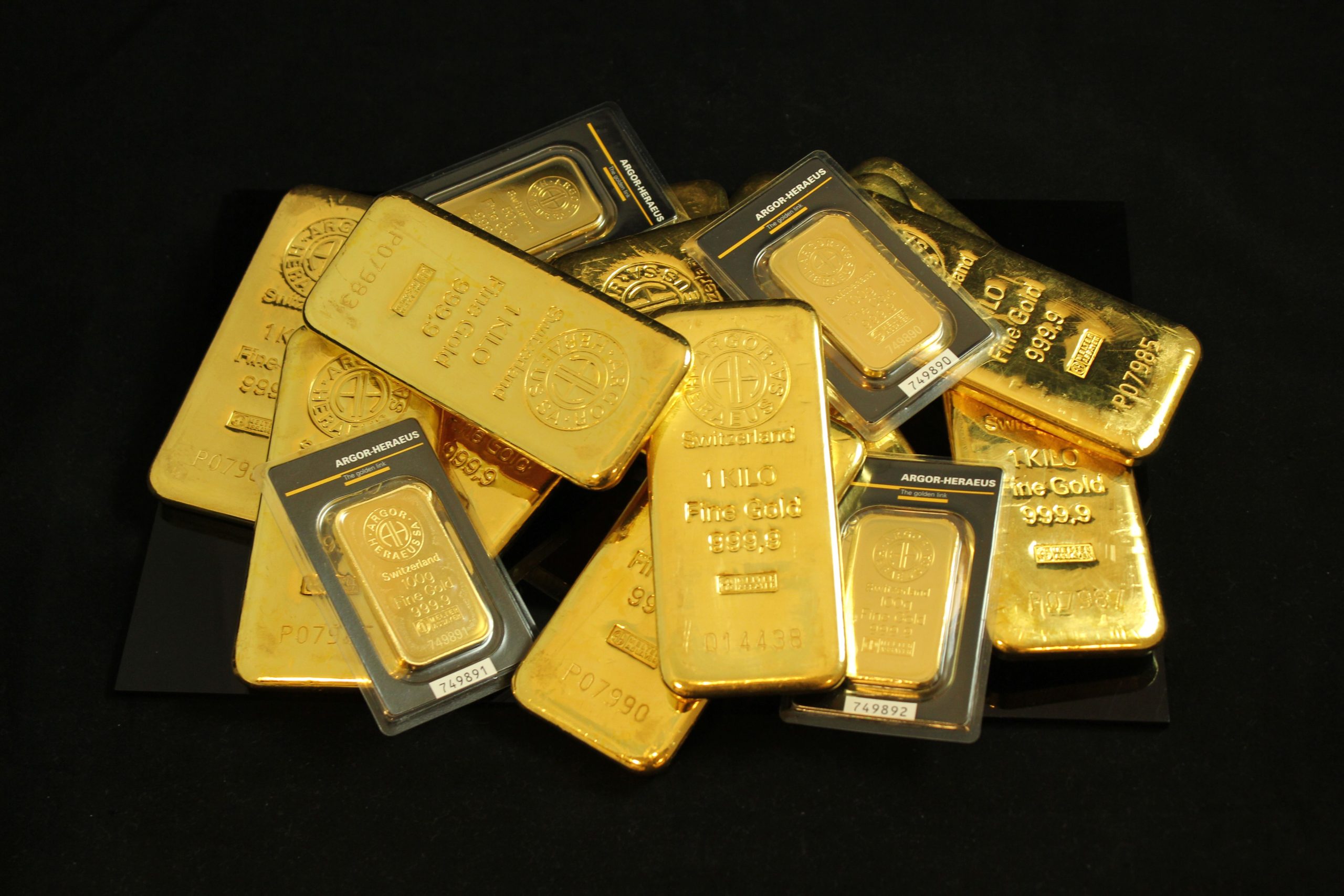 Gold bars representing precious metals trading and safe-haven demand