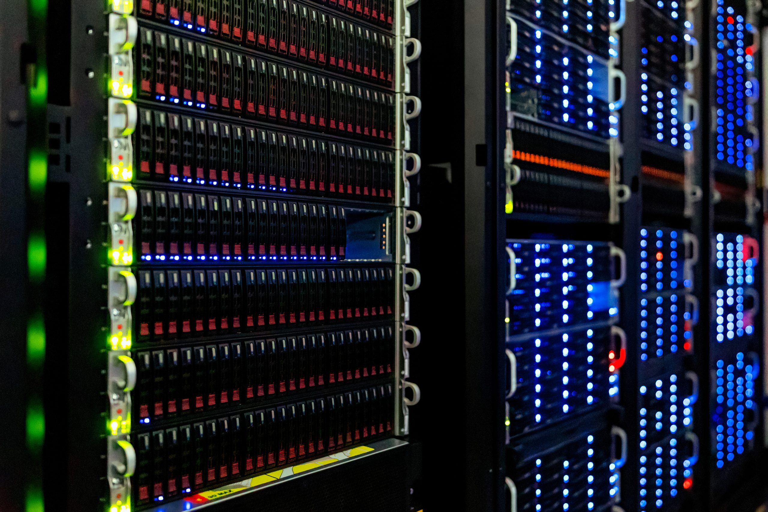 Server racks representing cloud data infrastructure and artificial intelligence demand