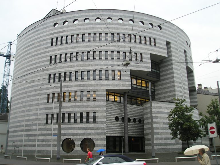 Bank for International Settlements building in Basel, illustrating the Financial Stability Board's bank-resolution funding review