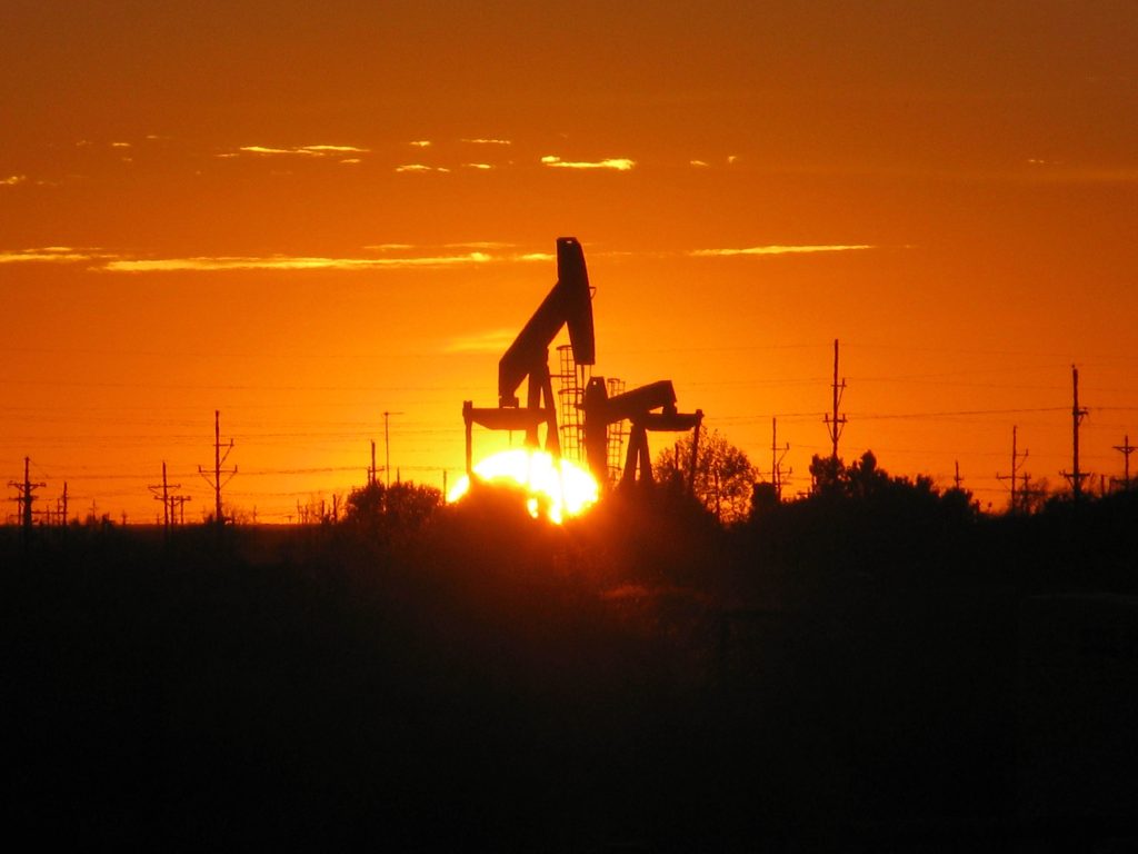 Silhouette of an oil pumpjack near Midland, Texas, at sunset