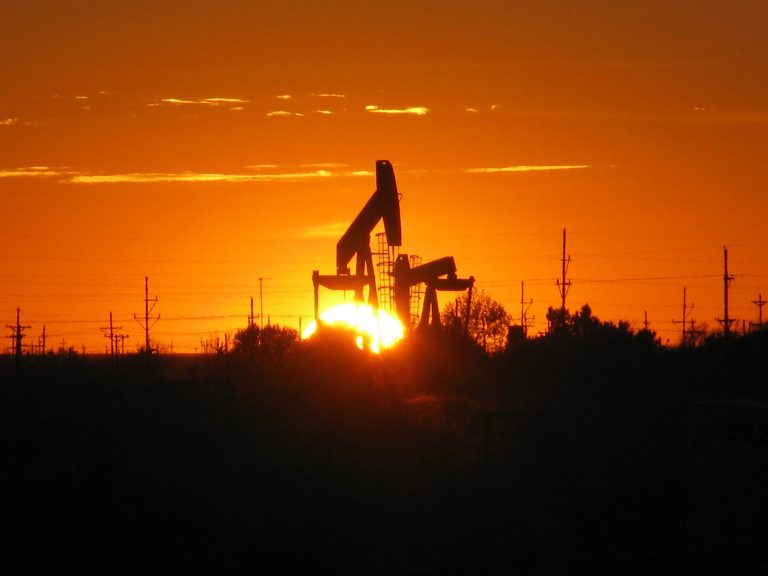 Silhouette of an oil pumpjack near Midland, Texas, at sunset